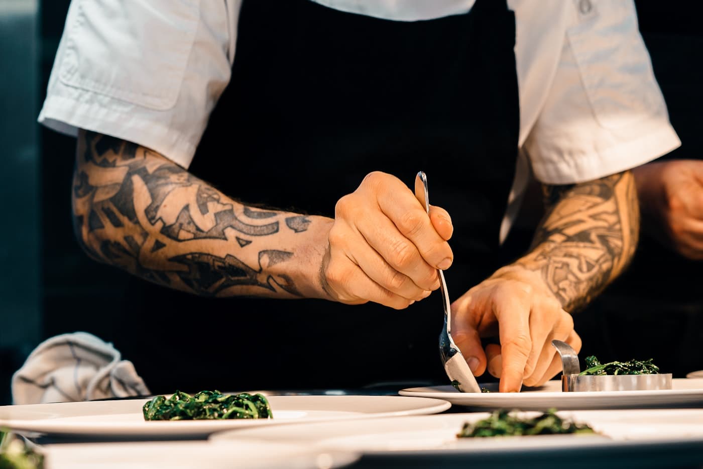 A cook plating at the pass.
